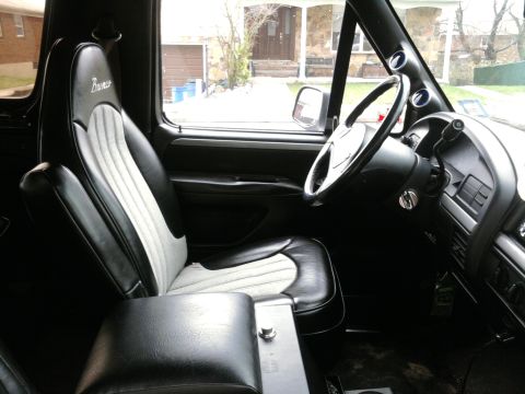 1992 Ford Bronco - Custom. Designed to match the rest of the Bronk. I put in rubber floor cover and painted the dash and door panels with black SEM. Nice, dif…