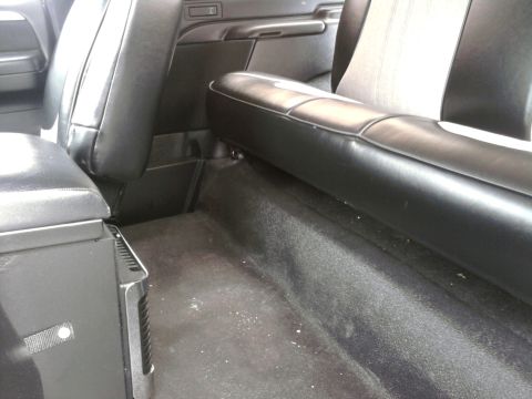 1992 Ford Bronco - small amp mounted on back of console to add just a little power to stereo.