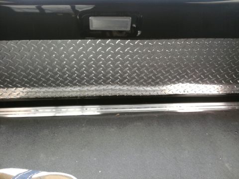 1992 Ford Bronco - inside tailgate cover. wanted OEM but very hard to come by. diamond plate is nice but the sunglare is unreal when tailgate is down.
