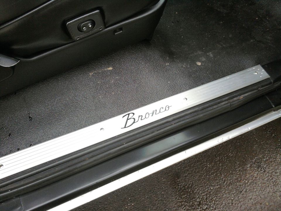 early bronco door sill plates. mounted on top of the OEM sill plate. nice look and fits the Bronk well. lumbar still works too.