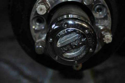 1974 Ford Bronco - Wheel hub with manual locking mechanism, likely for a 4x4 vehicle.