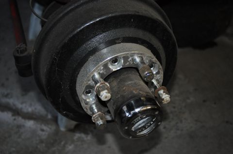 1974 Ford Bronco - This image shows a close-up of a vehicle's hub assembly, including the brake drum and wheel studs.