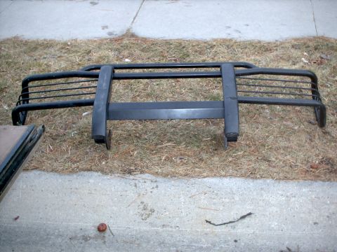 1991 Land Rover Range Rover - A black bull bar, likely for an off-road vehicle, is displayed on the ground.