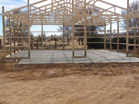 1995 Ford Bronco - Barn construction in progress, showing the wooden framing and concrete foundation.
