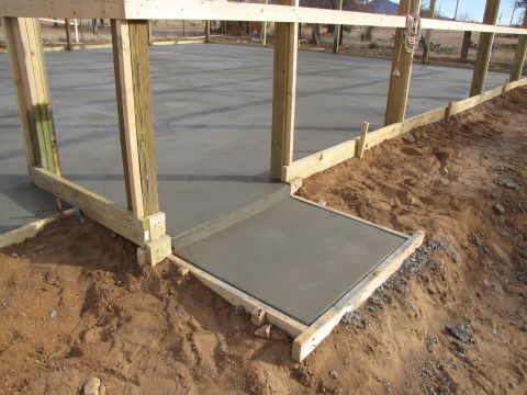 1995 Ford Bronco - A construction scene shows a concrete slab and ramp being formed with wooden supports.