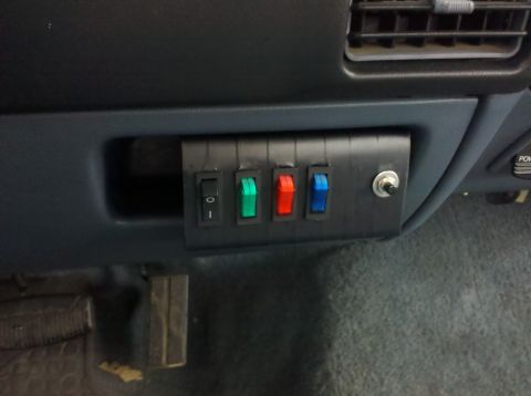 1992 Ford F-150 - Aftermarket switch panel with four toggle switches is installed on the dashboard.