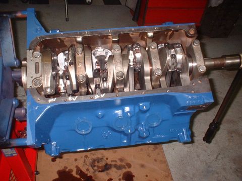 1969 Mercury Cyclone - Engine block assembly with crankshaft and connecting rods exposed.