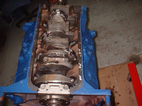 1969 Mercury Cyclone - Close-up of an engine block and crankshaft assembly, showing internal components.