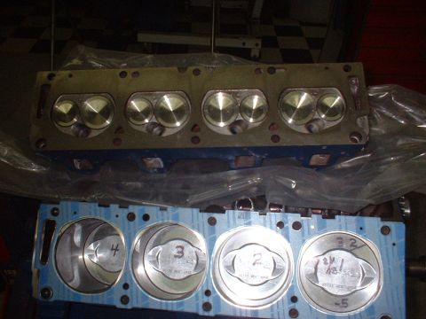 1969 Mercury Cyclone - Engine block and cylinder heads are shown, with pistons visible inside the block's cylinders.