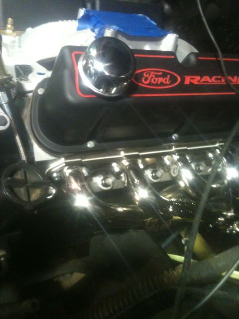 1993 Ford Bronco - Engine parts shown include a Ford Racing valve cover and exhaust manifold.