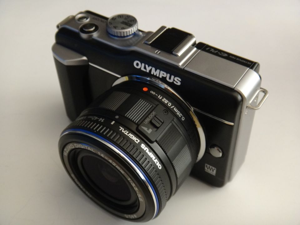 Olympus digital camera with a 14-40mm lens attached