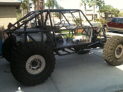 1966 Ford Bronco - This custom-built buggy features a heavy-duty roll cage and oversized off-road tires.