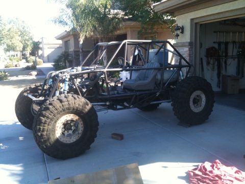1966 Ford Bronco - This custom off-road buggy frame is under construction in a driveway.