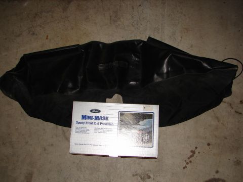 1992 Ford Taurus - Box for a Ford Mini-Mask car bra, with the bra itself laid out beside it.