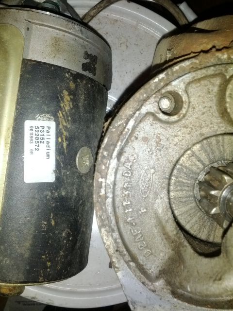 1979 Ford F-150 - Close-up of two starter motors, one labeled Palladium, the other cast with Ford markings.
