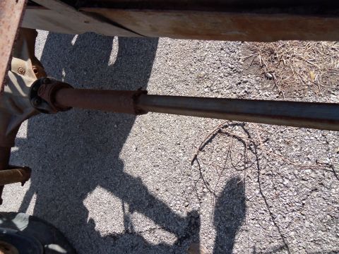 1987 Ford Ranger - The driveshaft and differential assembly appear heavily rusted, suggesting significant wear or age.