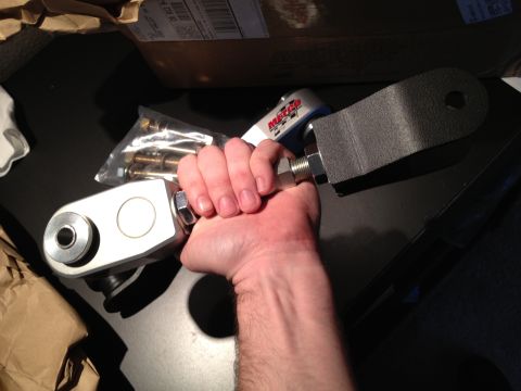 1992 Ford Crown Victoria - A Metco Control Arm part is held by a hand, with packaging and hardware visible.
