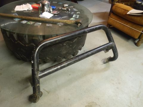 1979 Ford Bronco - Brush guard shown in front of a tire-based coffee table.