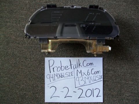 1994 Mazda MX-6 - Instrument cluster for a Mazda MX-6, with text indicating '94MX6LSZE' and '93MX6LSZE'.