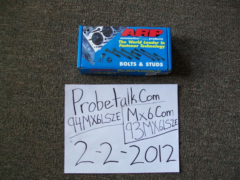 Box of ARP bolts and studs, with a handwritten note listing "94MX6LSZE Mx6.Com 93MX6LSZE 2-2-2012"