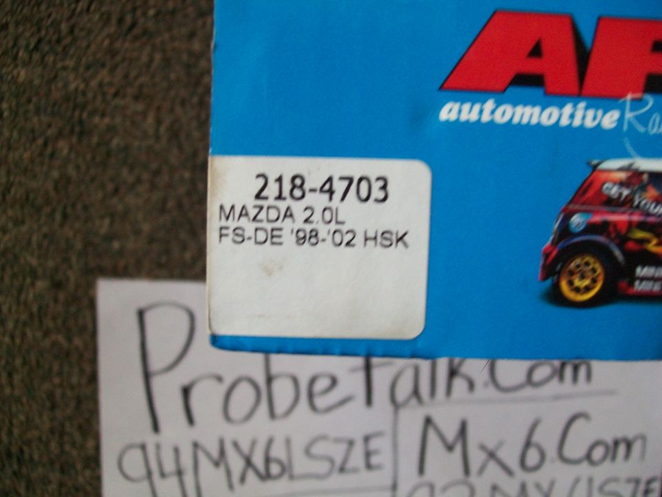 Part label for Mazda 2.0L FS-DE '98-'02 HSK, with handwritten '94MX6LSZE' and 'ProbeTalk.com'