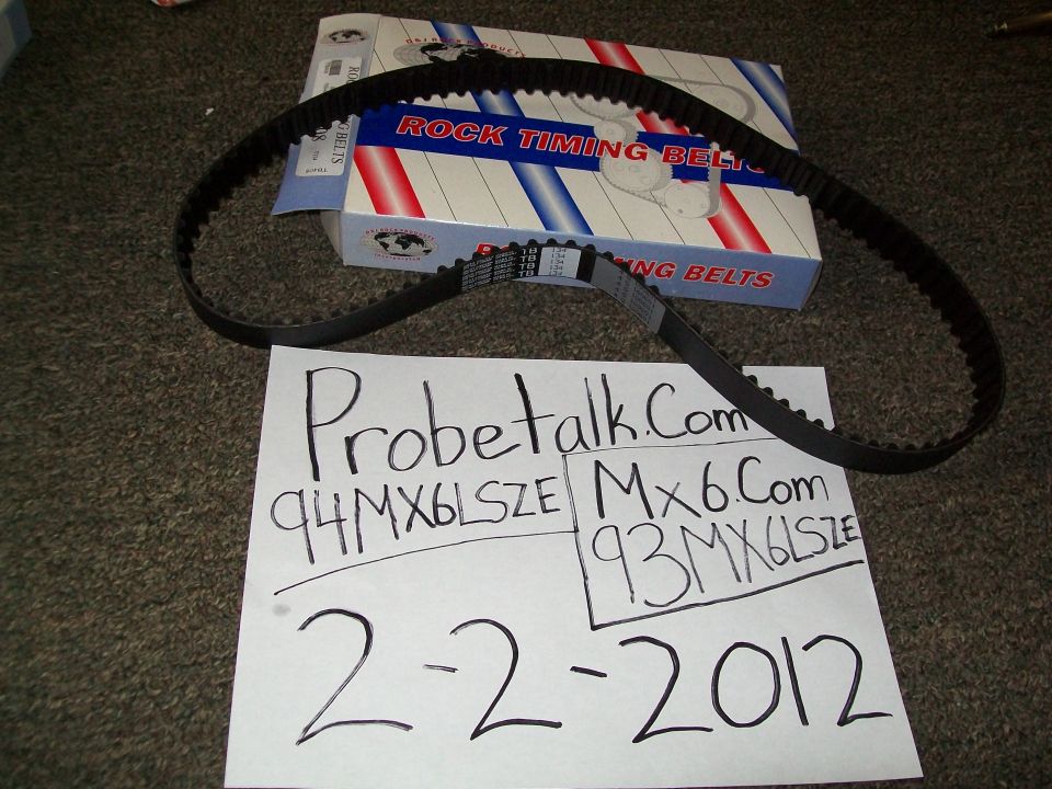 Timing belt and box with text '94MX6LSZE' and '93MX6LSZE'
