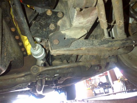 1965 Ford Mustang - Undercarriage view showing steering linkage and suspension parts. The registry information may be incorrect.