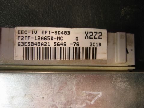 1992 Ford Bronco - Close-up of an electronic control unit with part numbers and a barcode visible.
