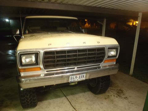1979 Ford Bronco - Front view of a 1979 Ford Bronco, showing its grille and headlights.