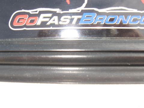 1994 Ford Bronco - A decal with "GoFast Bronco" text is visible on a dark surface.