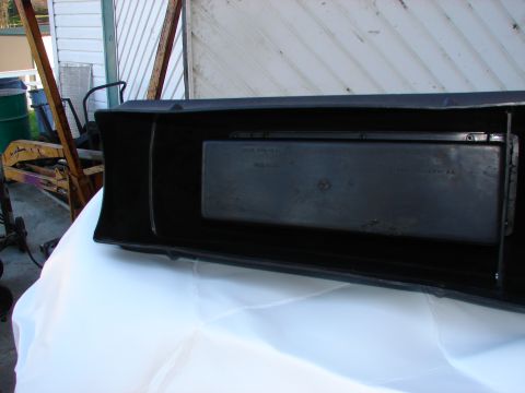 1973 Ford Ranchero - A black plastic component, possibly an interior part, is shown with some faint text visible on its surface.