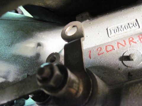 1969 Ford Fairlane - Close-up of an engine component showing 'FOMOTO' and red ink markings '120NRB'.
