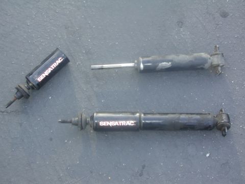 1992 Mercury Grand Marquis - The old front Sensacraps. Note how the top of one has completely broken off the rest of the shock!