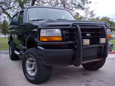 1995 Ford Bronco - Front 3/4 view of a black 1995 Ford Bronco equipped with a bull bar.