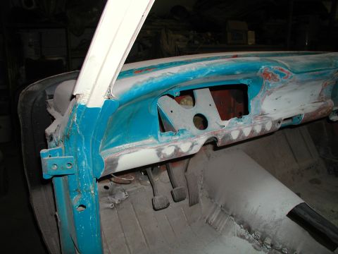 1960 Ford Ranchero - The interior dashboard of a 1960 Ford Ranchero is shown during a repair process, with exposed metal and primer visible.