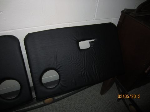 1979 Ford Bronco - These are two black car door panels, likely for a classic vehicle, shown leaning against a wall.