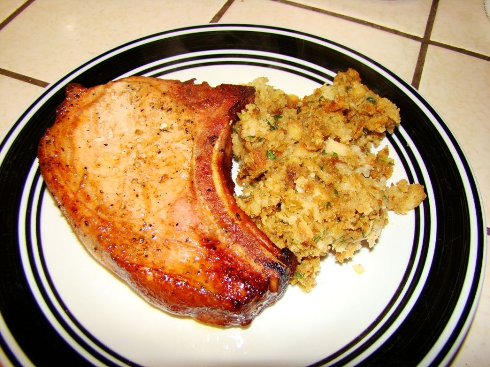 Pork chop and stuffing on a plate