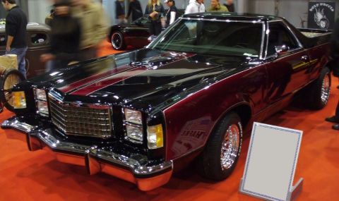 1979 Ford Ranchero - This 1979 Ford Ranchero features a striking black and maroon two-tone paint scheme with red racing stripes.
