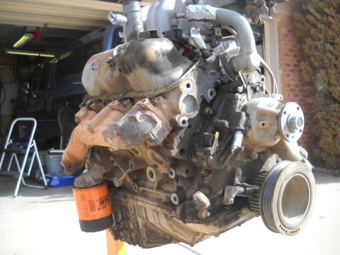 1992 Ford Explorer - Engine removed from a vehicle and mounted on a stand for repair or replacement.