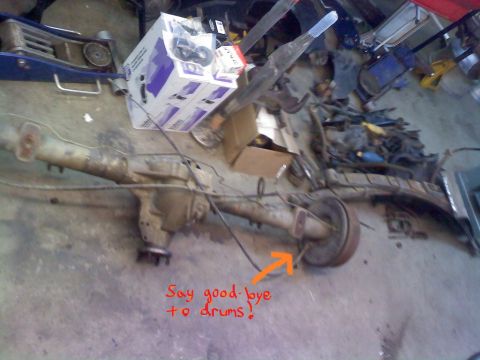1996 Ford Bronco - Rear axle assembly with drum brakes, likely removed for an upgrade or repair.