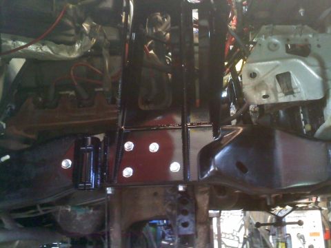 1996 Ford Bronco - Custom suspension components installed on a vehicle frame, with a visible Supermotors.net watermark.