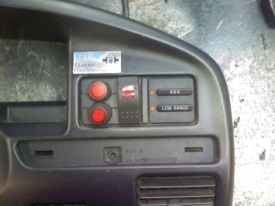 Dashboard with buttons for 4x4, low range, and front differential locker