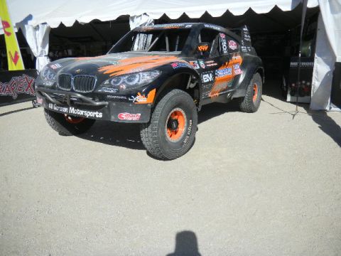 1997 Ford Ranger - This off-road race truck features a custom body kit and aggressive tires, suggesting it's built for extreme terrain.