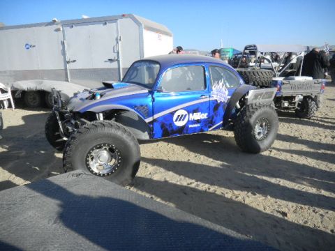 1997 Ford Ranger - This custom off-road buggy features a striking blue paint scheme with Miller sponsorship and is equipped for terrain with oversized tires.
