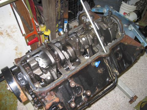 2005 Ford Excursion - The internal components of an engine block, including the crankshaft and connecting rods, are visible.