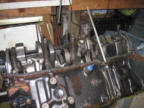 2005 Ford Excursion - Close-up view of an engine block with internal components visible, likely during a repair or rebuild.