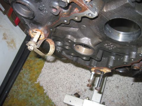 2005 Ford Excursion - Close-up view of an engine block with visible rust and mounting hardware.