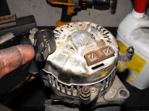 1982 Chrysler New Yorker - This protective insulator comes off the Denso with a 12mm deep socket. The stock 82' power wire has it's own shroud attached to the wire an…