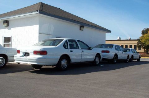 1998 Ford Crown Victoria - Three 9C1 Caprices to the side of the office. The rear one was in great shape with no exterior holes. Of course, it was already sold. (larg…