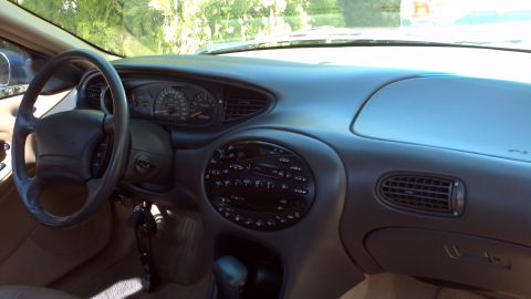 1996 Ford Taurus - Interior view of a 1996 Ford Taurus, showing the dashboard and steering wheel.